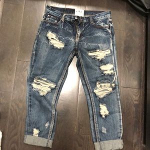 Ripped acid wash jeans